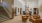 a room with a staircase chairs and tables