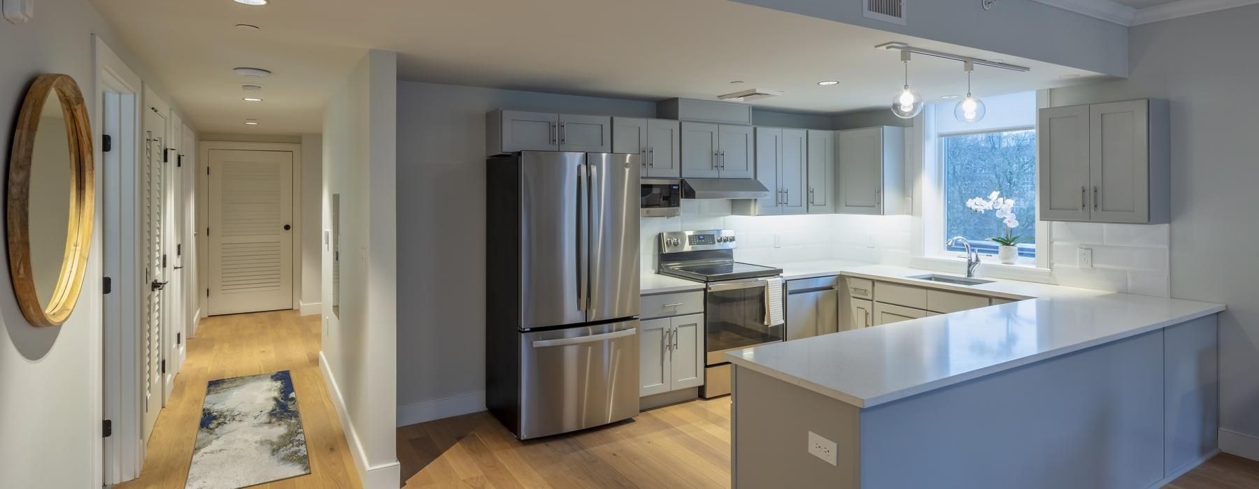 a kitchen with stainless steel appliances